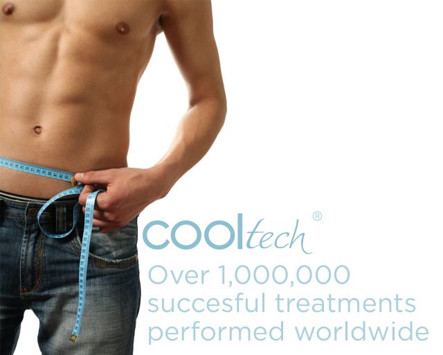 Muscular man with measuring tape across waist for fat reduction